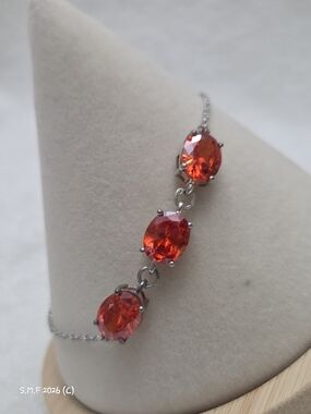 Orange Simulated Diamond Three-Stone Bracelet